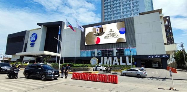 an led screen display at a top of a mall