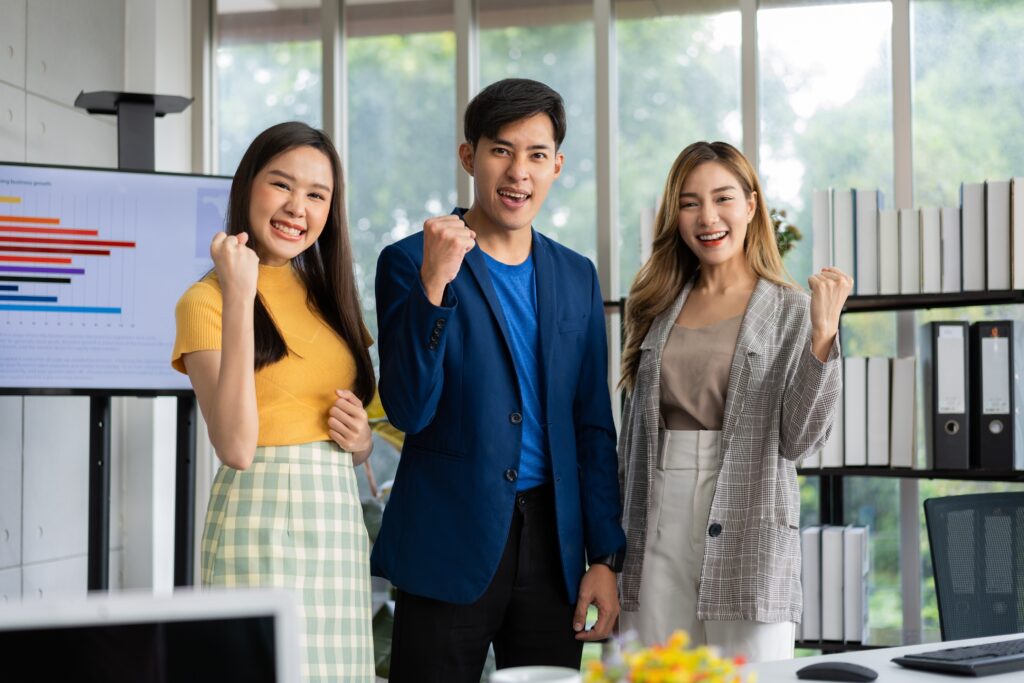 people at the office standing