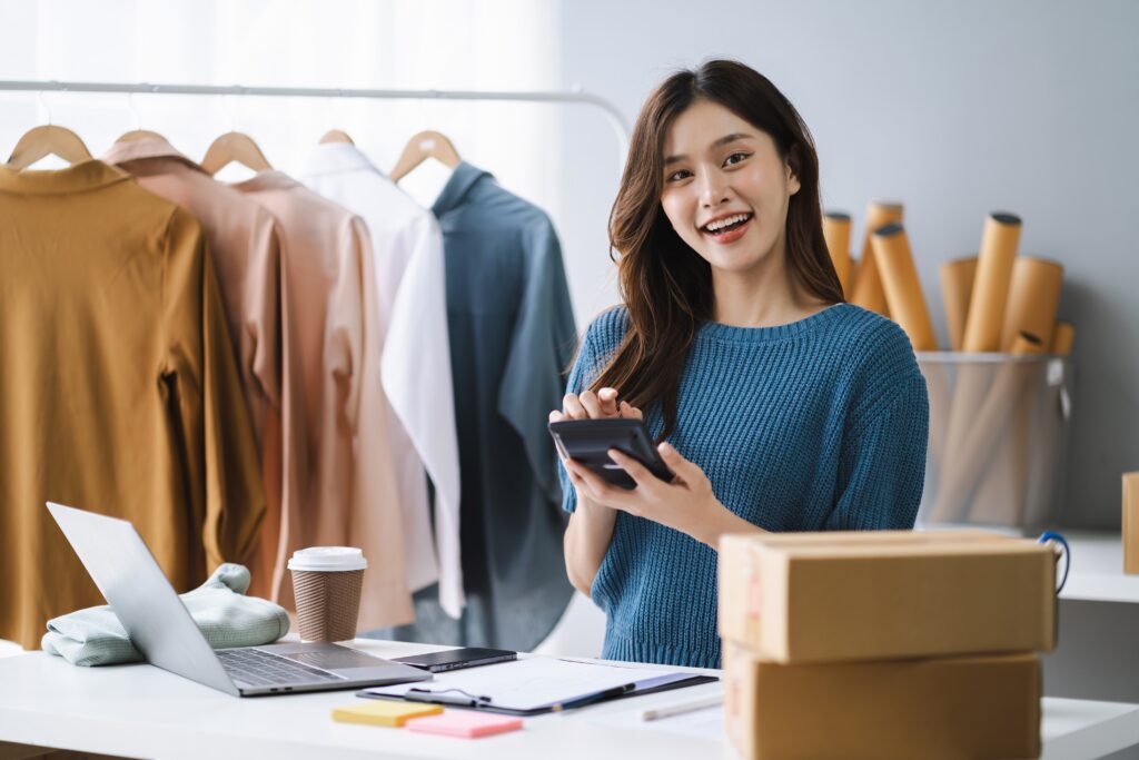 a retail expert holding her phone