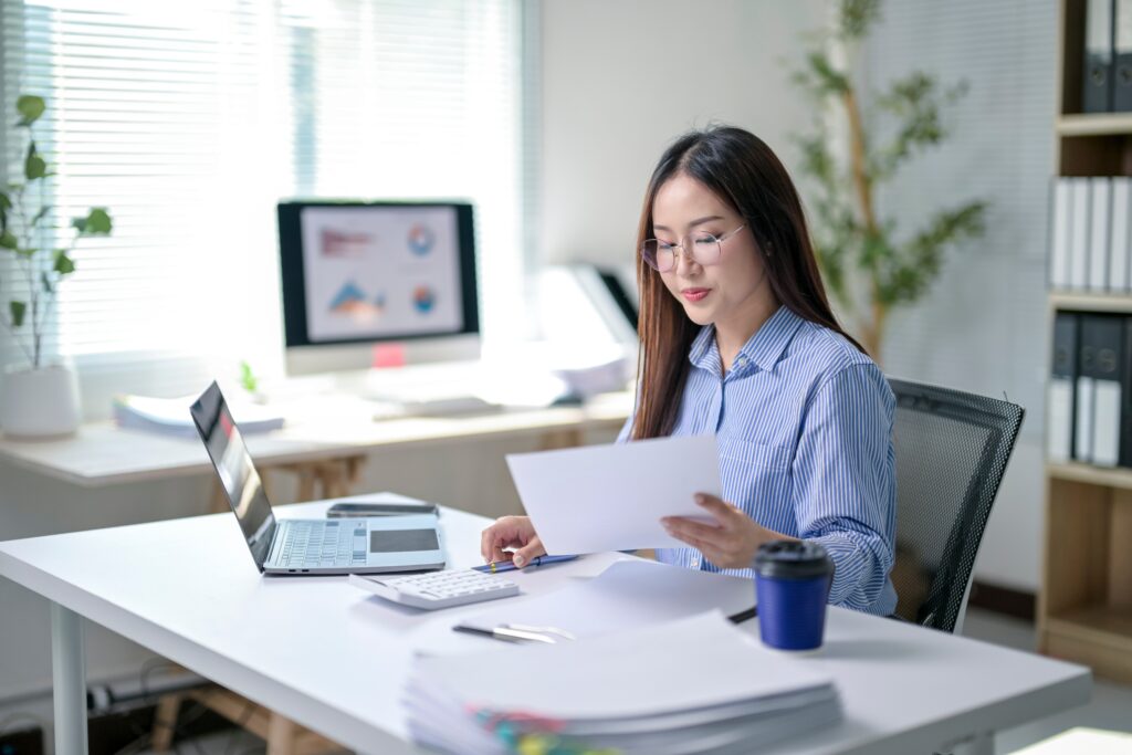 a retail owner reading a document